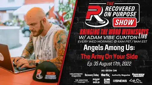 Bald man with tattoos works on a laptop outdoors. Text promotes "The Recovered On Purpose Show," episode details, and media features. Vibrant, focused tone.