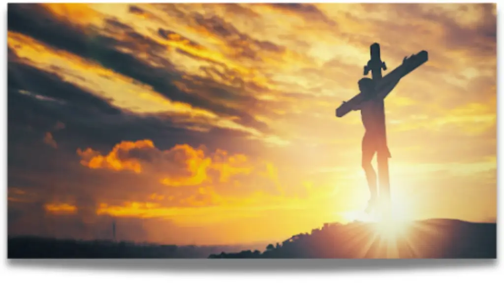 Silhouette of a statue on a hill against a vibrant sunset, with dramatic clouds and radiant sunlight. Evokes a serene and contemplative atmosphere.