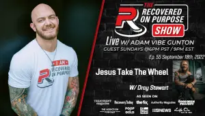 A bald man with tattoos smiles confidently, wearing a "Recovered On Purpose" shirt. Text promotes "The Recovered On Purpose Show" with guest Dray Stewart, airing September 18th, 2022, 6 PM PST/9 PM EST.